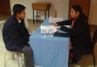 Dr. Anubhuti counselling the students at CCA School Gurgaon